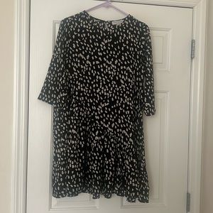 Hayden Dress. Asymmetrical seam going down the bottom 1/3 of the dress